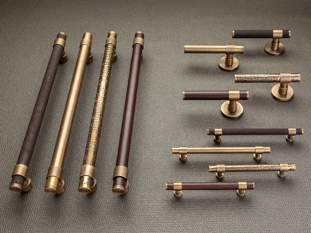 Turnstyle Designs cabinet hardware in Leather — Flatlay